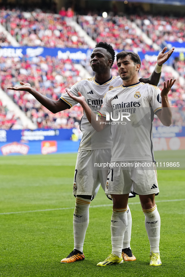 Brahim Diaz attacking midfield of Real Madrid and Spain celebrates with Vinicius Junior left winger of Real Madrid and Brazil after scoring...