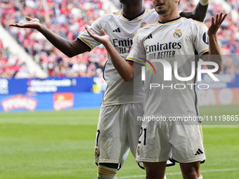 Brahim Diaz attacking midfield of Real Madrid and Spain celebrates with Vinicius Junior left winger of Real Madrid and Brazil after scoring...