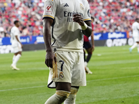 Vinicius Junior left winger of Real Madrid and Brazil protest too referee during the LaLiga EA Sports match between CA Osasuna and Real Madr...