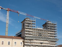 A building site and a crane on Saints Massimo and George Cathedral is seen in L'Aquila, Italy, on April 5th, 2024. on April 6th L'Aquila wil...