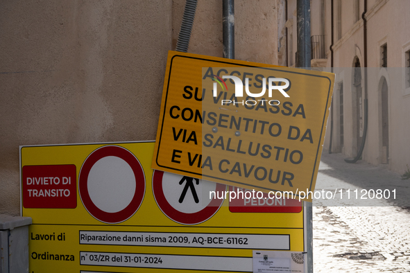 Road signals indicating reconstruction work are seen in L'Aquila, Italy, on April 5th, 2024. On April 6th L'Aquila will commemorate its 15th...