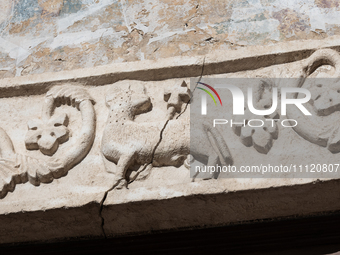 A damaged Holy Lamb is seen on a church facade in L'Aquila, Italy, on April 5th, 2024. on April 6th L'Aquila will commemorate its 15th anniv...