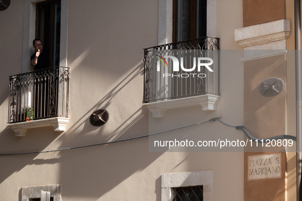 A man reacting on his balcony is seen in L'Aquila, Italy, on April 5th, 2024. On April 6th L'Aquila will commemorate its 15th anniversary of...