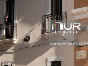 A man reacting on his balcony is seen in L'Aquila, Italy, on April 5th, 2024. On April 6th L'Aquila will commemorate its 15th anniversary of...