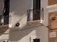 A man reacting on his balcony is seen in L'Aquila, Italy, on April 5th, 2024. On April 6th L'Aquila will commemorate its 15th anniversary of...