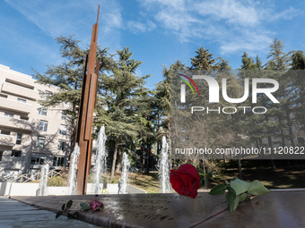 A red rose laid in Memorial Park is seen in L'Aquila, Italy, on April 5th, 2024. On April 6th L'Aquila will commemorate its 15th anniversary...