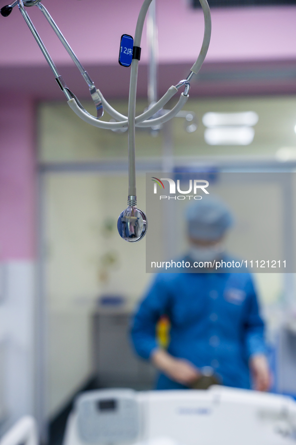 A stethoscope is hanging from the bedside of an intensive care unit in Enshi, Hubei Province, China, on April 5, 2024. 