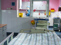 A nurse is dispensing medicine in an intensive care room in Enshi, Hubei Province, China, on April 5, 2024. (