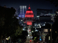 City Hall is being illuminated in red for World TB Day in San Francisco, California, on March 24, 2024. Earlier in March, California voters...