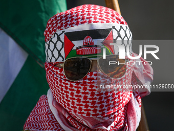 EDMONTON, CANADA - APRIL 07:
A young member of the Palestinian diaspora wearing Keffiyeh seen during the 'Stop Genocide Rally' at Violet Kin...