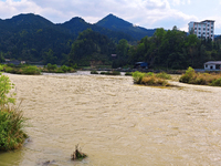 The water level of the Liangjiang River is rising after heavy rains in Datong Township, Qiandongnan County, Guizhou Province, China, on Apri...