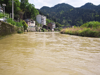 The water level of the Liangjiang River is rising after heavy rains in Datong Township, Qiandongnan County, Guizhou Province, China, on Apri...