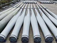 Wind turbine blades are being manufactured at a company in Yangzhou, China, on April 8, 2024. (