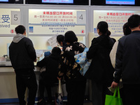 Parents are taking their children to see a doctor at a hospital in Shanghai, China, on April 9, 2024. (