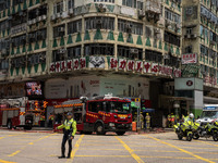 A general view is showing the building that is on fire in Hong Kong's Jordan District on April 10, 2024. The fire has resulted in 5 deaths a...