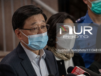 Hong Kong Chief Executive John Lee is visiting Queen Elizabeth Hospital in Hong Kong, on April 10, 2024. A building fire in Hong Kong's Jord...