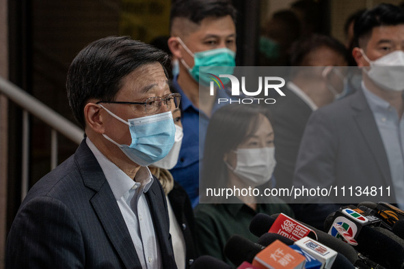 Hong Kong Chief Executive John Lee is visiting Queen Elizabeth Hospital in Hong Kong, on April 10, 2024. A building fire in Hong Kong's Jord...