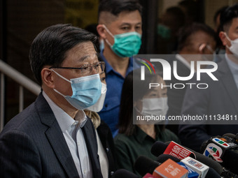 Hong Kong Chief Executive John Lee is visiting Queen Elizabeth Hospital in Hong Kong, on April 10, 2024. A building fire in Hong Kong's Jord...