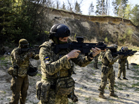 Servicemen from the Siberian Battalion of the Ukrainian Armed Forces International Legion are attending military exercises in the Kyiv regio...