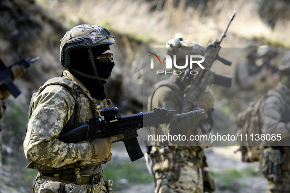 Servicemen from the Siberian Battalion of the Ukrainian Armed Forces International Legion are attending military exercises in the Kyiv regio...