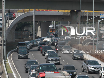 Vehicles are moving along the North-South corridor near the Ciccillo Matarazzo overpass in the southern zone of the city on Thursday morning...