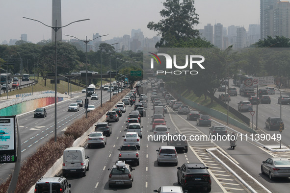 Vehicles are moving along the North-South corridor near the Ciccillo Matarazzo overpass in the southern zone of the city on Thursday morning...