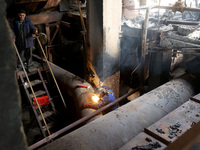 A worker is welding at the Kharkiv Combined Heat and Power Plant (CHP) in the Kharkiv Region, northeastern Ukraine, on April 11, 2024. The p...