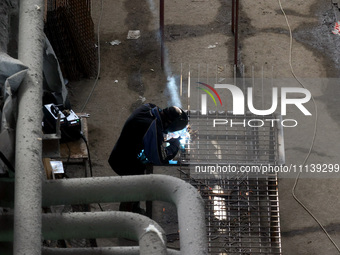 A worker is welding at the Kharkiv Combined Heat and Power Plant (CHP) in the Kharkiv Region, northeastern Ukraine, on April 11, 2024. The p...