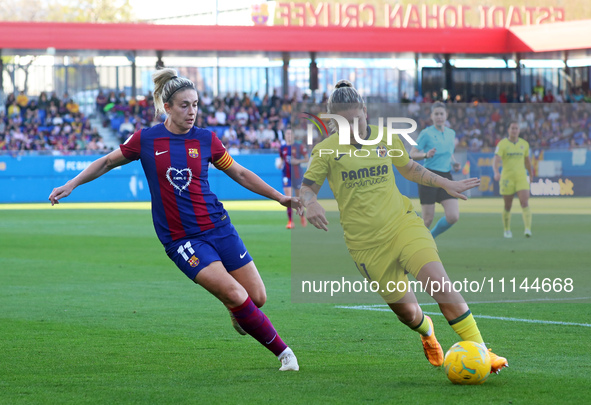 Alexia Putellas and Claudia Iglesias are playing in the match between FC Barcelona and Villarreal CF for week 23 of the Liga F at the Johan...