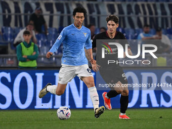 Daichi Kamada of S.S. Lazio and Alessandro Zanoli of U.S. Salernitana 1919 are competing during the 32nd day of the Serie A Championship bet...