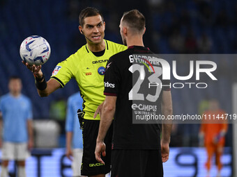 Referee Luca Zufferli and Norbert Gyomber of U.S. Salernitana 1919 are seen during the 32nd day of the Serie A Championship between S.S. Laz...