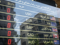 An electronic board is being displayed at a currency exchange shop in Tehran's business district, Iran, on April 13, 2024. The Prime Ministe...