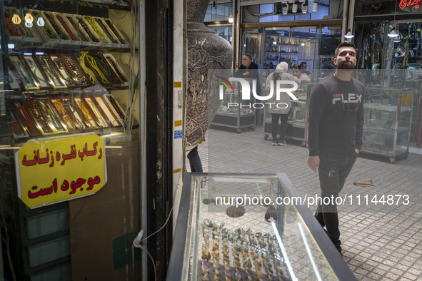 A young Iranian man is looking on while standing at the Grand Bazaar in southern Tehran, Iran, on April 13, 2024. The Prime Minister of Isra...