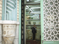 An Iranian man is praying at a small mosque near the Grand Bazaar in southern Tehran, Iran, on April 13, 2024. Meanwhile, the Prime Minister...