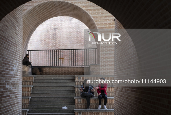 Iranian youths are sitting at an underground station in downtown Tehran, Iran, on April 13, 2024. The Prime Minister of Israel, Benjamin Net...