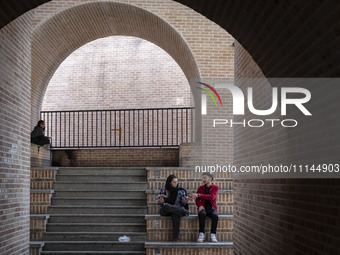 Iranian youths are sitting at an underground station in downtown Tehran, Iran, on April 13, 2024. The Prime Minister of Israel, Benjamin Net...