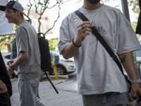 Iranian art students are standing together on a sidewalk in downtown Tehran, Iran, on April 13, 2024. The Prime Minister of Israel, Benjamin...