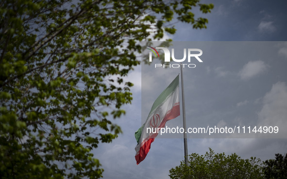 An Iranian flag is waving in downtown Tehran, Iran, on April 13, 2024. The Prime Minister of Israel, Benjamin Netanyahu, is threatening Iran...