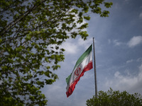 An Iranian flag is waving in downtown Tehran, Iran, on April 13, 2024. The Prime Minister of Israel, Benjamin Netanyahu, is threatening Iran...