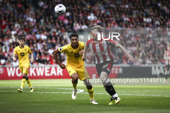 Nathan Collins of Brentford is on the ball during the Premier League match between Brentford and Sheffield United at the Gtech Community Sta...