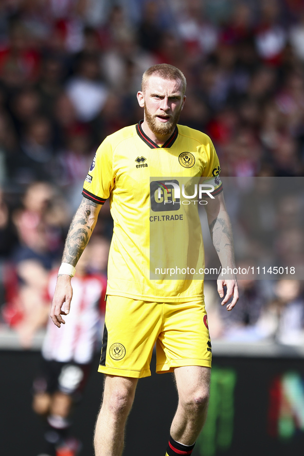 Oliver McBurnie of Sheffield United is playing during the Premier League match between Brentford and Sheffield United at the Gtech Community...