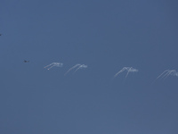 An Israeli Air Force attack helicopter is releasing flares during a flyover above the Gaza Strip on April 14, 2024, amid ongoing battles in...