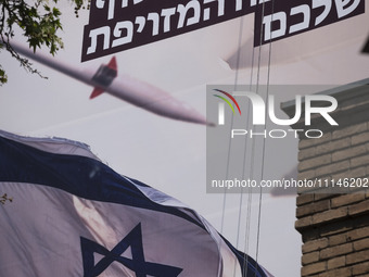 An anti-Israeli mural, which illustrates appreciation for the IRGC missile and UAV attack on Israel, is being displayed on a governmental bu...