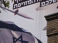 An anti-Israeli mural, which illustrates appreciation for the IRGC missile and UAV attack on Israel, is being displayed on a governmental bu...