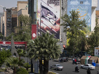 An anti-Israeli mural, which illustrates appreciation for the IRGC missile and UAV attack on Israel, is being displayed on a governmental bu...