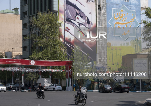 An anti-Israeli mural, which illustrates appreciation for the IRGC missile and UAV attack on Israel, is being displayed on a governmental bu...