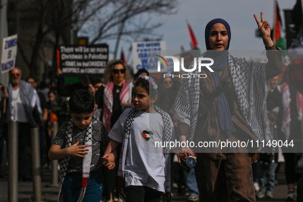 EDMONTON, CANADA - APRIL 14:
Members of the Palestinian diaspora supported by local activists, during the 'Stop Genocide Now' rally, marchin...