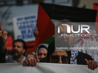 EDMONTON, CANADA - APRIL 14:
Members of the Palestinian diaspora supported by local activists, during the 'Stop Genocide Now' rally, marchin...