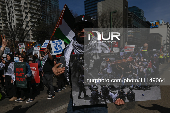 EDMONTON, CANADA - APRIL 14:
Members of the Palestinian diaspora supported by local activists, during the 'Stop Genocide Now' rally, marchin...