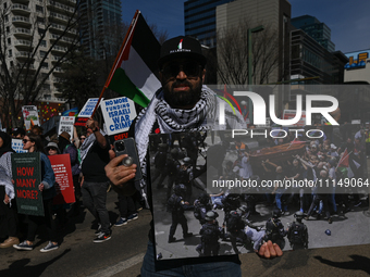 EDMONTON, CANADA - APRIL 14:
Members of the Palestinian diaspora supported by local activists, during the 'Stop Genocide Now' rally, marchin...